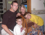 Simba with Nick, Lisa, Chase & Austyn